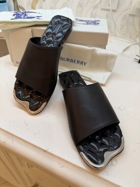 Burberry Black Quilted Leather Slide Mules with Silver Trim. New in box. Size 38
